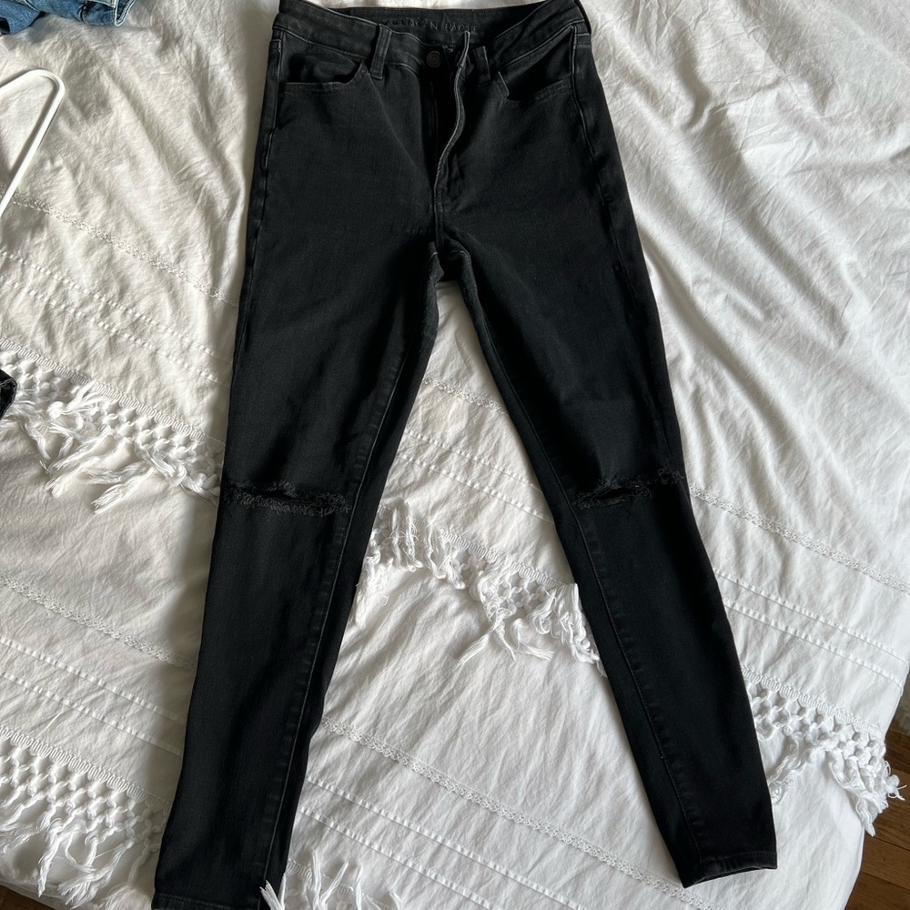 black ripped jeans
